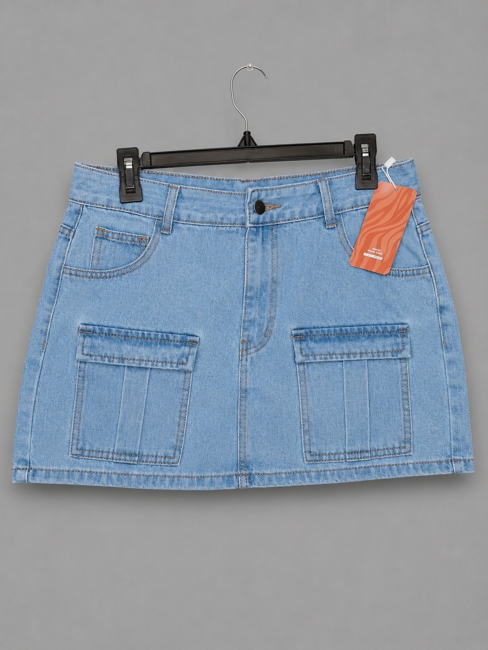 SHEIN Light Blue Denim Mini Skirt with Front Patch Pockets